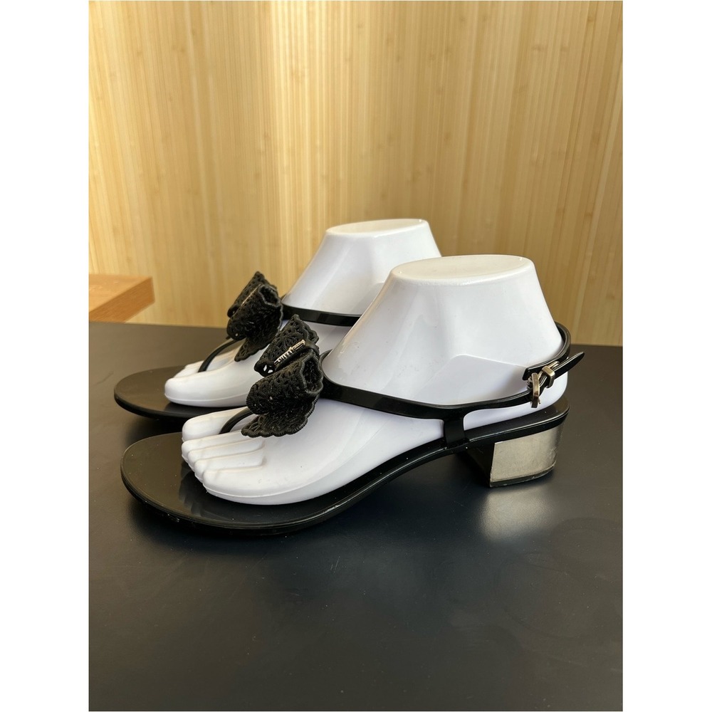 Salvatore Ferragamo Black Patent T-Strap Sandals with Floral Appliqué